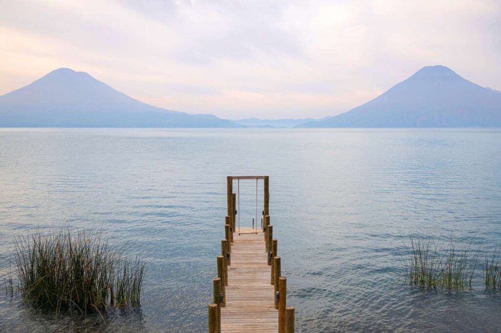 The 'lake como of central america' has blue green waters, colorful